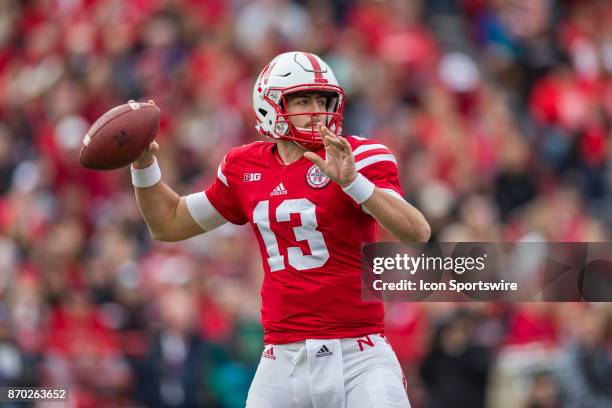 Nebraska Cornhusker quarterback Tanner Lee drops back to pass against the Northwestern Wildcats during the first half November 04, 2017 at Memorial...