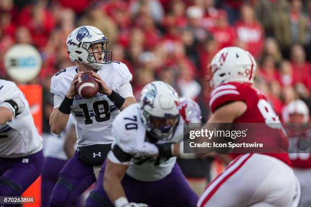 Northwestern Wildcat quarterback Clayton Thorson drops back to pass against the Nebraska Cornhuskers during the first half November 04, 2017 at...