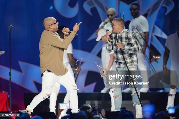 Gente de Zona performs onstage during the iHeartRadio Fiesta Latina: Celebrating Our Heroes at American Airlines Arena on November 4, 2017 in Miami,...