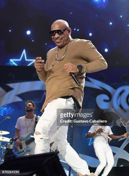 Alexander Delgado from Gente de Zona performs onstage during the iHeartRadio Fiesta Latina: Celebrating Our Heroes at American Airlines Arena on...