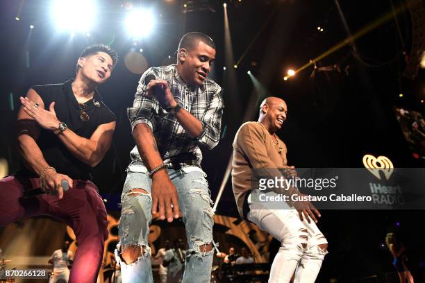 Chyno Miranda and Gente de Zona perform onstage during the iHeartRadio Fiesta Latina: Celebrating Our Heroes at American Airlines Arena on November...