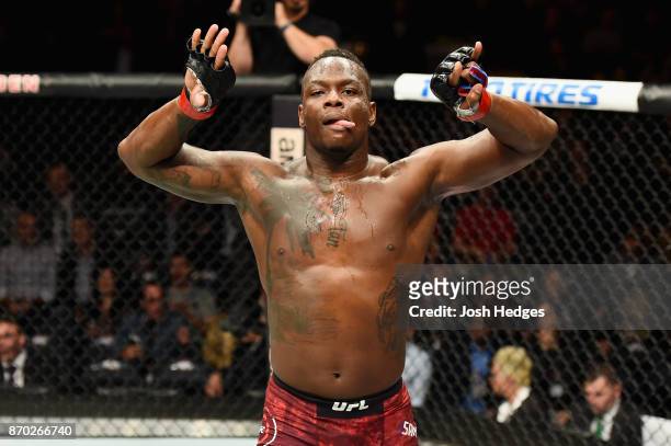 Ovince Saint Preux celebrates his victory over Corey Anderson in their light heavyweight bout during the UFC 217 event at Madison Square Garden on...