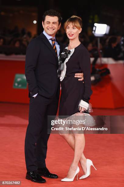 Vinicio Marchioni and Milena Mancini walk a red carpet for 'The Place' during the 12th Rome Film Fest at Auditorium Parco Della Musica on November 4,...