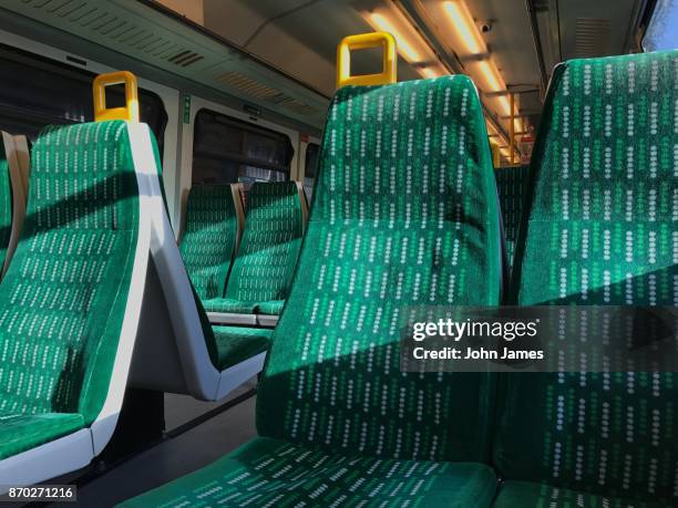 train seats - train interior stock pictures, royalty-free photos & images