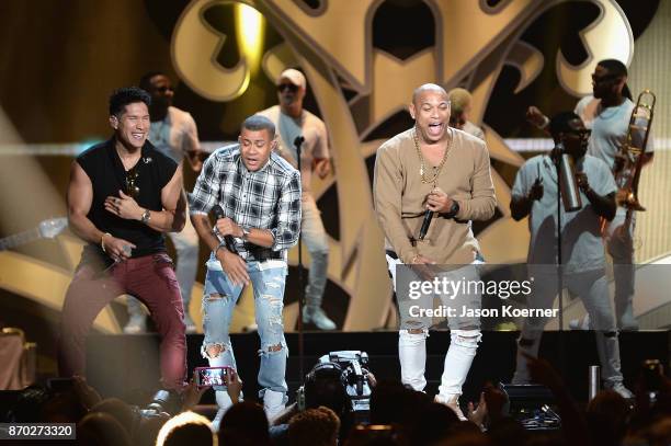 Chyno Miranda and Gente de Zona performs onstage during the iHeartRadio Fiesta Latina: Celebrating Our Heroes at American Airlines Arena on November...