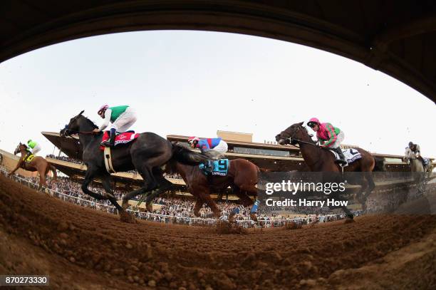 View of the field racing during the Breeders' Cup Classic on day two of the 2017 Breeders' Cup World Championship at Del Mar Race Track on November...