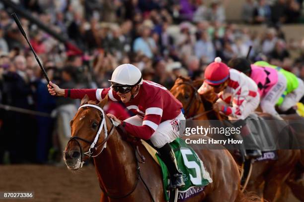Gun Runner ridden by Florent Geroux defeats Collected ridden by Martin Garcia and West Coast ridden by Javier Castellano to win the Breeders' Cup...
