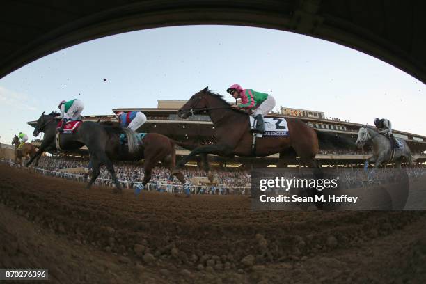 View of the field racing during the Breeders' Cup Classic on day two of the 2017 Breeders' Cup World Championship at Del Mar Race Track on November...