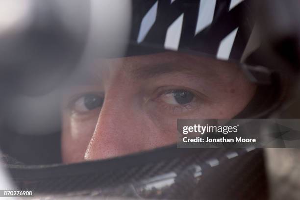 Chris Eggleston, driver of the NAPA Filters Toyota, sits in his car during practice for the NASCAR K&N Pro Series West Coast Stock Car Hall of Fame...