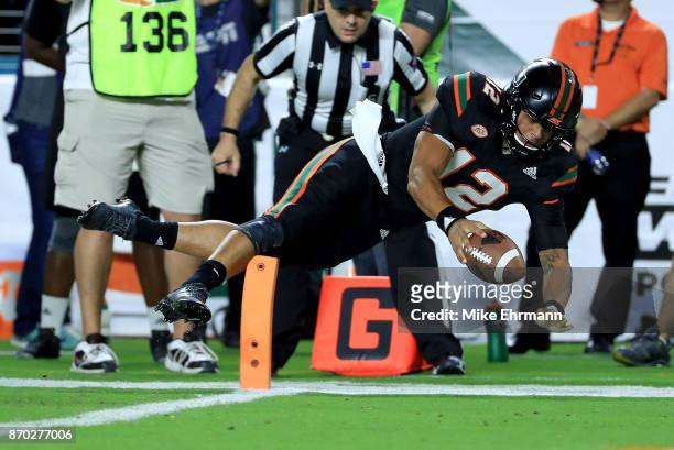 Malik Rosier of the Miami Hurricanes rushes during a game against the Virginia Tech Hokies at Hard Rock Stadium on November 4, 2017 in Miami Gardens,...