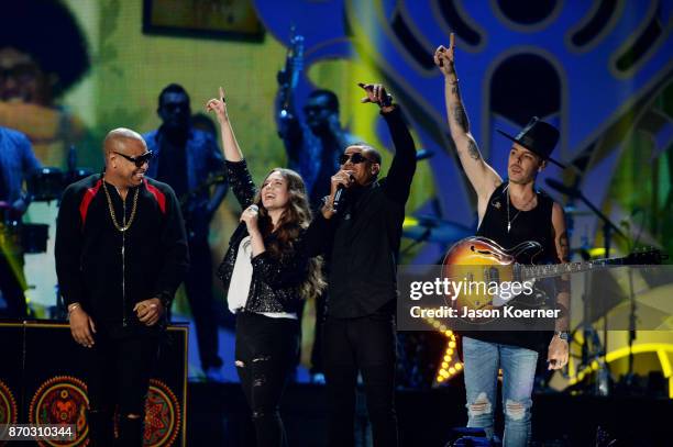 Alexander Delgado, Tirzah Joy Huerta, Randy Malcom and Jesse Eduardo Huerta perform onstage during the iHeartRadio Fiesta Latina: Celebrating Our...