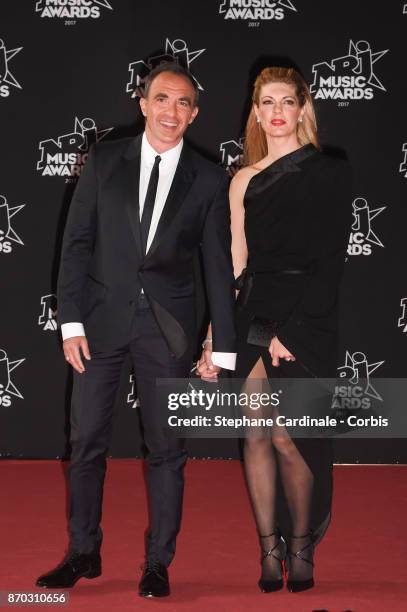 Nikos Aliagas and Tina Grigoriou attend the 19th NRJ Music Awards on November 4, 2017 in Cannes, France.