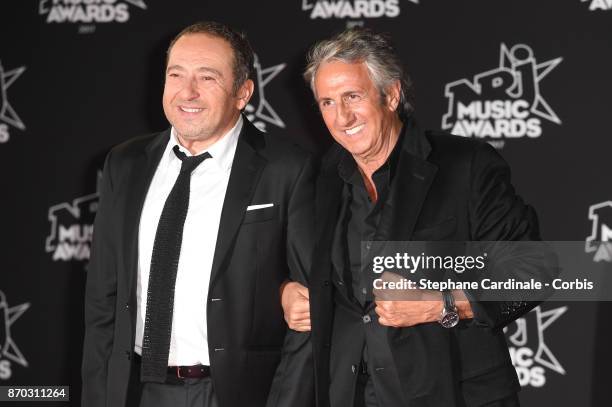 Patrick Timsit and Richard Anconina attend the 19th NRJ Music Awards on November 4, 2017 in Cannes, France.