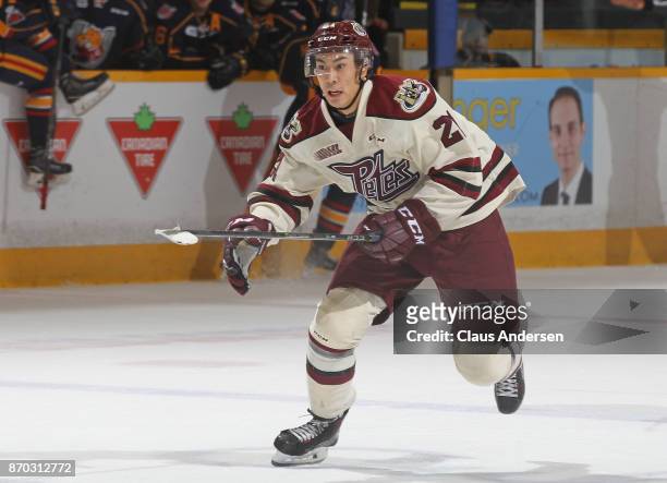 Jonathan Ang of the Peterborough Petes skates against the Barrie Colts during an OHL game at the Peterborough Memorial Centre on November 4, 2017 in...