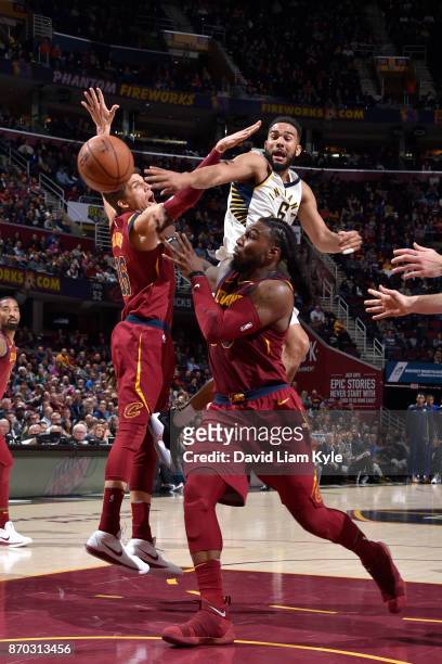 Jae Crowder of the Cleveland Cavaliers goes for the block on the shot by Cory Joseph of the Indiana Pacers during the game between the two teams on...