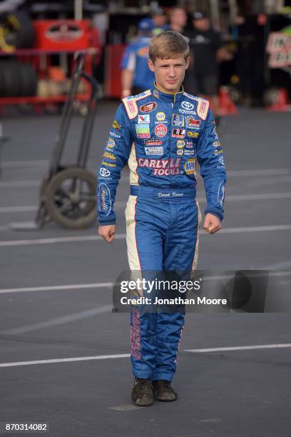 Derek Kraus, driver of the Carlyle Tools Toyota, walks to his car during qualifying for the NASCAR K&N Pro Series West Coast Stock Car Hall of Fame...