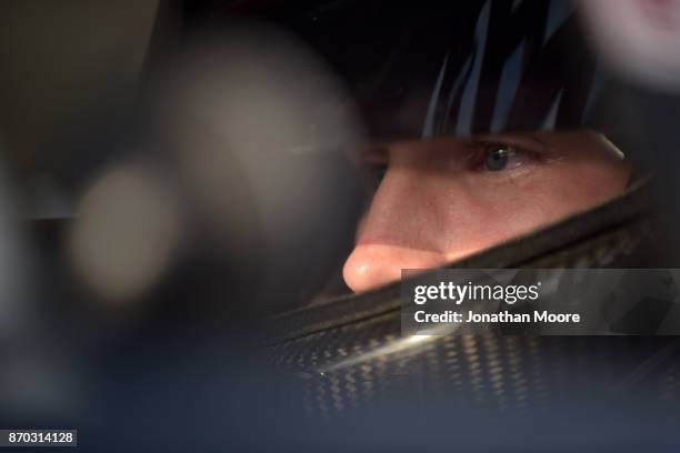 Derek Kraus, driver of the Carlyle Tools Toyota, sits in his car during qualifying for the NASCAR K&N Pro Series West Coast Stock Car Hall of Fame...
