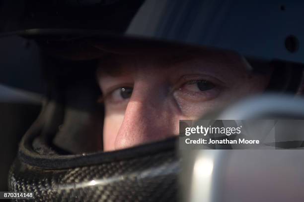 Todd Gilliland, driver of the NAPA Auto Parts Toyota, sits in his car during qualifying for the NASCAR K&N Pro Series West Coast Stock Car Hall of...