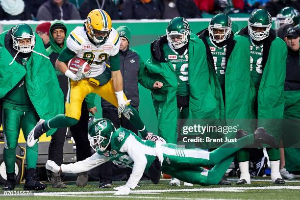 Brandon Zylstra of the Edmonton Eskimos makes a catch in front of the Roughrider bench in the game between the Edmonton Eskimos and Saskatchewan...