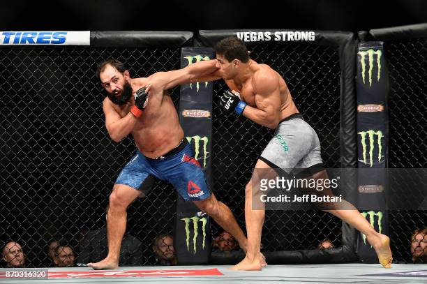 Paulo Costa of Brazil fights Johny Hendricks in their middleweight bout during the UFC 217 event at Madison Square Garden on November 4, 2017 in New...