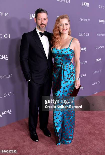Actors Darren Le Gallo and Amy Adams, wearing Gucci, attend the 2017 LACMA Art + Film Gala Honoring Mark Bradford and George Lucas presented by Gucci...