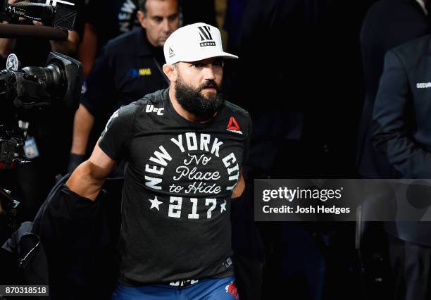 Johny Hendricks approaches the octagon for his middleweight bout against Paulo Costa of Brazil during the UFC 217 event at Madison Square Garden on...