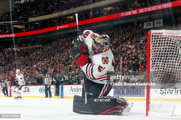 Corey Crawford of the Chicago Blackhawks makes a save against the Minnesota Wild during the game at the Xcel Energy Center on November 4, 2017 in St....