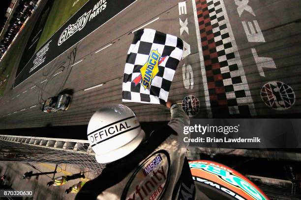 Erik Jones, driver of the GameStop/Call of Duty WWII Toyota, takes the checkered flag to win the NASCAR XFINITY Series O'Reilly Auto Parts 300 at...