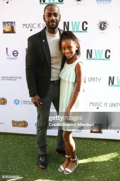 Actor Mo McRae and daughter attend the 8th Annual "Movies By Kids" Awards Show at Fox Studios on November 4, 2017 in Los Angeles, California.