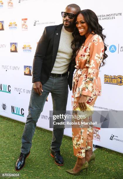 Mo McRae and Yvonne Orji attend the 8th Annual "Movies By Kids" Awards Show at Fox Studios on November 4, 2017 in Los Angeles, California.