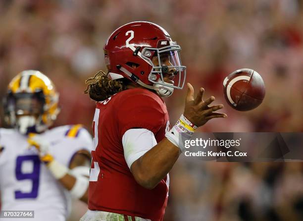 Jalen Hurts of the Alabama Crimson Tide reacts after rushing for a touchdown against the LSU Tigers at Bryant-Denny Stadium on November 4, 2017 in...