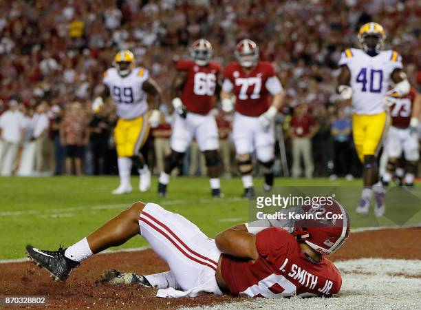 Irv Smith Jr. #82 of the Alabama Crimson Tide pulls in touchdown reception against the LSU Tigers at Bryant-Denny Stadium on November 4, 2017 in...