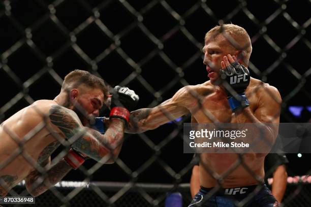 Dillashaw fights Cody Garbrandt in their UFC bantamweight championship bout during the UFC 217 event at Madison Square Garden on November 4, 2017 in...