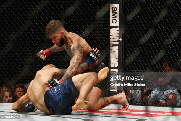 Dillashaw fights Cody Garbrandt in their UFC bantamweight championship bout during the UFC 217 event at Madison Square Garden on November 4, 2017 in...