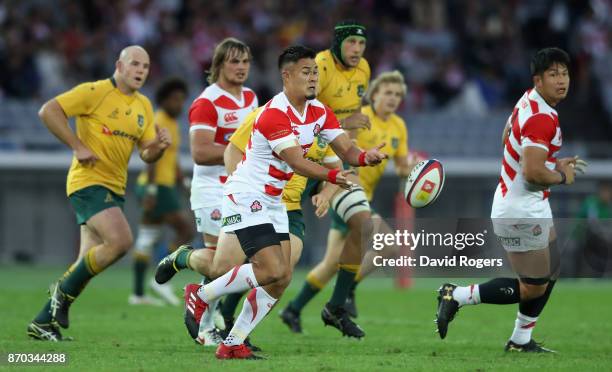 Yu Tamura of Japan passes the ball during the rugby union international match between Japan and Australia Wallabies at Nissan Stadium on November 4,...