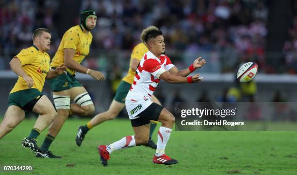 Yu Tamura of Japan passes the ball during the rugby union international match between Japan and Australia Wallabies at Nissan Stadium on November 4,...