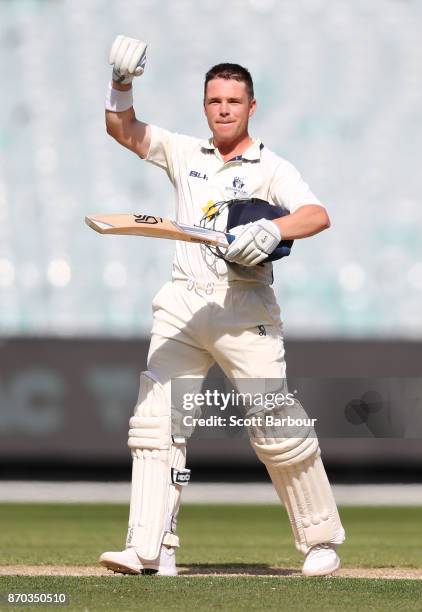 Marcus Harris of Victoria celebrates as he reaches his century during day two of the Sheffield Shield match between Victoria and South Australia at...