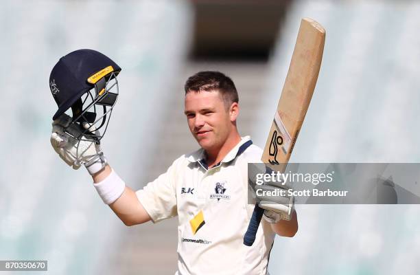 Marcus Harris of Victoria celebrates as he reaches his century during day two of the Sheffield Shield match between Victoria and South Australia at...