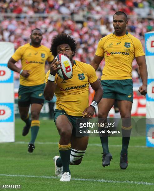 Henry Speight of Australia celebrates after scoring their second try during the rugby union international match between Japan and Australia Wallabies...