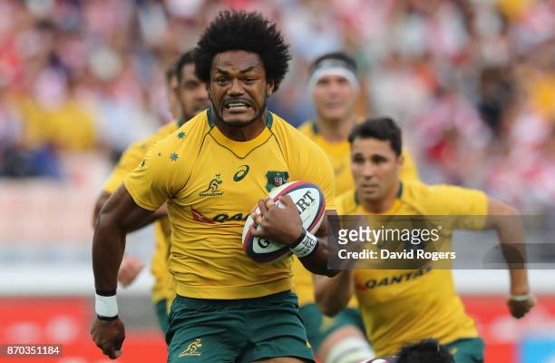 Henry Speight of Australia breaks through to score their second try during the rugby union international match between Japan and Australia Wallabies...