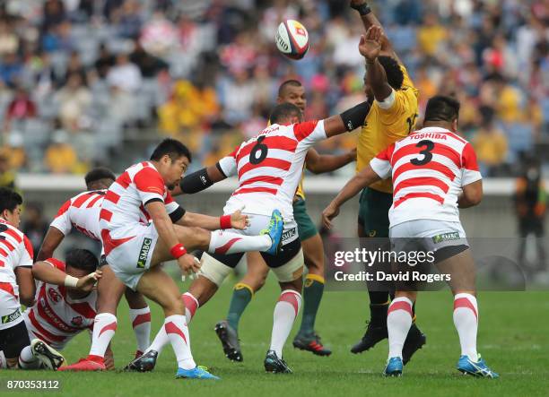 Fumiaki Tanaka of Japan kicks the ball upfield during the rugby union international match between Japan and Australia Wallabies at Nissan Stadium on...