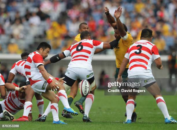 Fumiaki Tanaka of Japan kicks the ball upfield during the rugby union international match between Japan and Australia Wallabies at Nissan Stadium on...