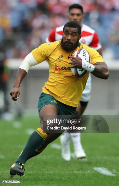 Marika Koroibete of Australia breaks with the ball during the rugby union international match between Japan and Australia Wallabies at Nissan Stadium...