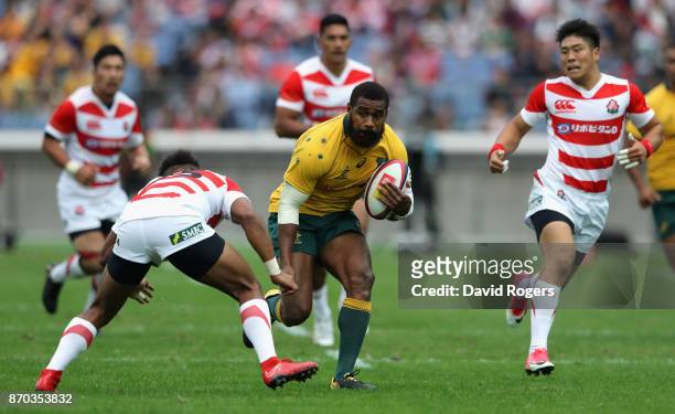 Marika Koroibete of Australia breaks with the ball during the rugby union international match between Japan and Australia Wallabies at Nissan Stadium...