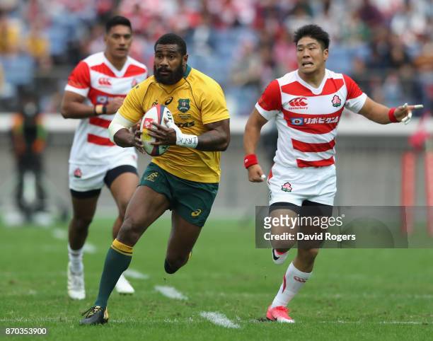 Marika Koroibete of Australia breaks with the ball during the rugby union international match between Japan and Australia Wallabies at Nissan Stadium...