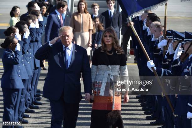 President Donald Trump and his wife Melania Trump are welcomed with an official ceremony upon their arrival at Yokota Air Base in Fussa City near...