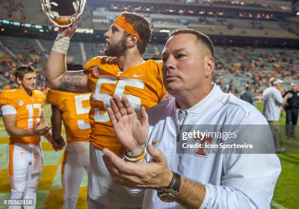 Tennessee Volunteers head coach Butch Jones celebrates with offensive lineman Coleman Thomas after a game between the Southern Miss Golden Eagles and...