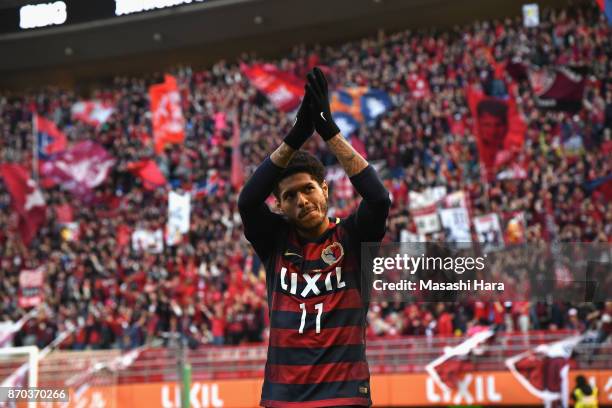 Leandro of Kashima Antlers applauds supporters after his side's 1-0 victory in the J.League J1 match between Kashima Antlers and Urawa Red Diamonds...