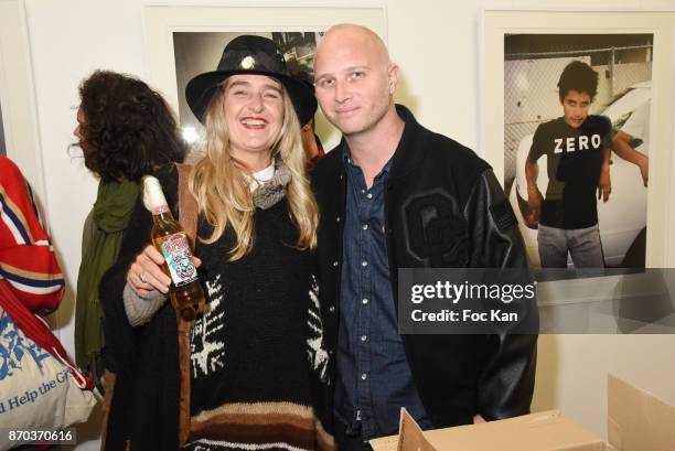 Geraldine Beigbeder and gallerist Romain Battaglia attend the Larry Clark and Jonathan Velasquez Photo Exhibition at Galerie Rue Andre Antoine...