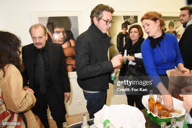 Director/painter Larry Clark , PR Sarah Aguilar and guests attend the Larry Clark and Jonathan Velasquez Photo Exhibition at Galerie Rue Andre...